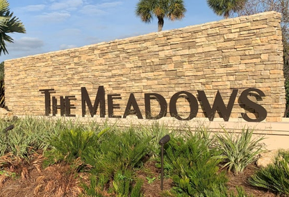 The Meadows community sign